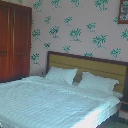 Ju Yuan Ge Hotel Санья Экстерьер фото